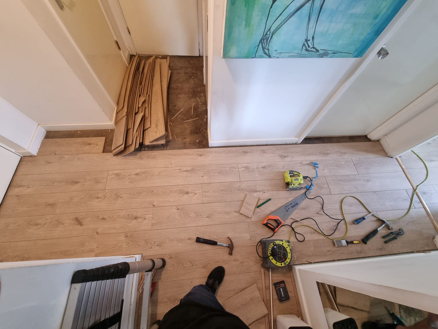 Floor repair and preparation work around a landing area